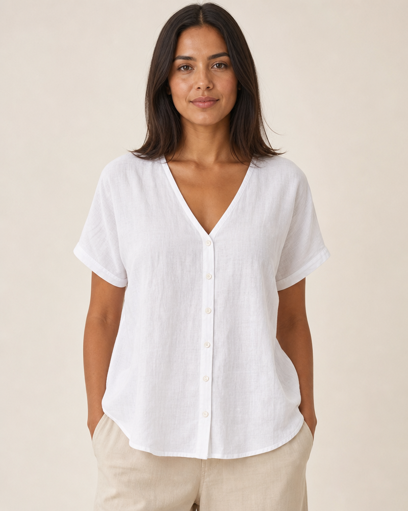 Blusa Cathlyn de mezcla de algodón y lino en blanco, con cuello en V y botones delanteros.